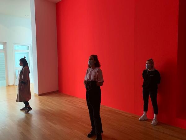 People standing in an exhibition